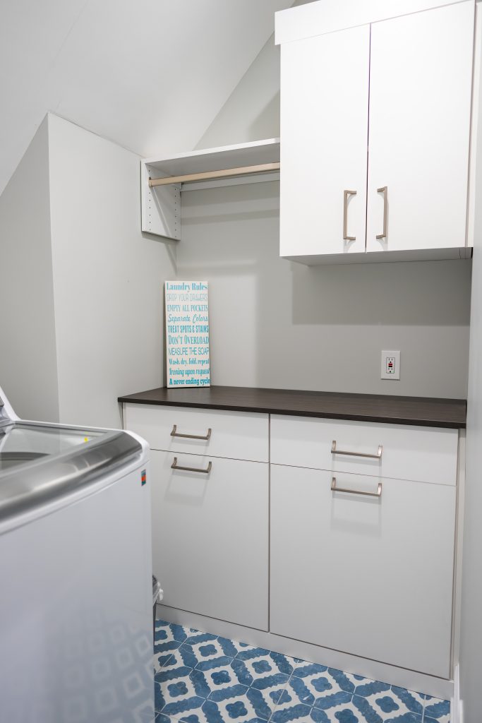 laundry room with blue accents