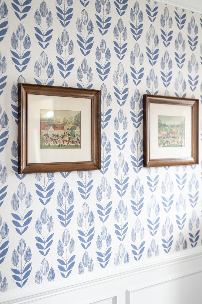 artwork on patterned dining room wall